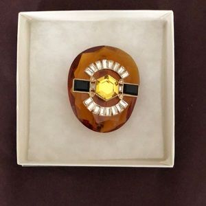 Mixed media brooch, amber with onyx gold tone and crystal accents.